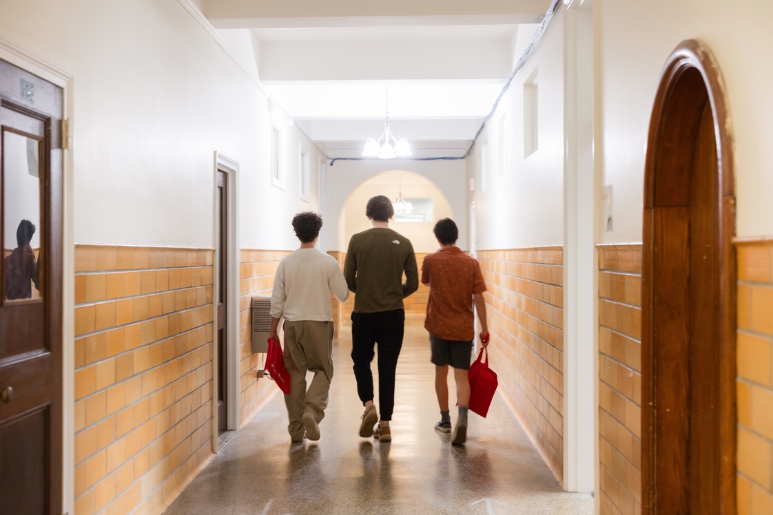 Students walking down hallway